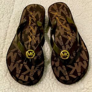 Michael Kors flip flops size 6M with wedge heel